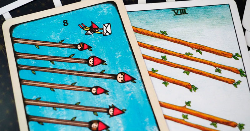 手紙が描かれたDelos Tarotのワンド8